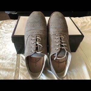 Men’s Nine West grey shoes.